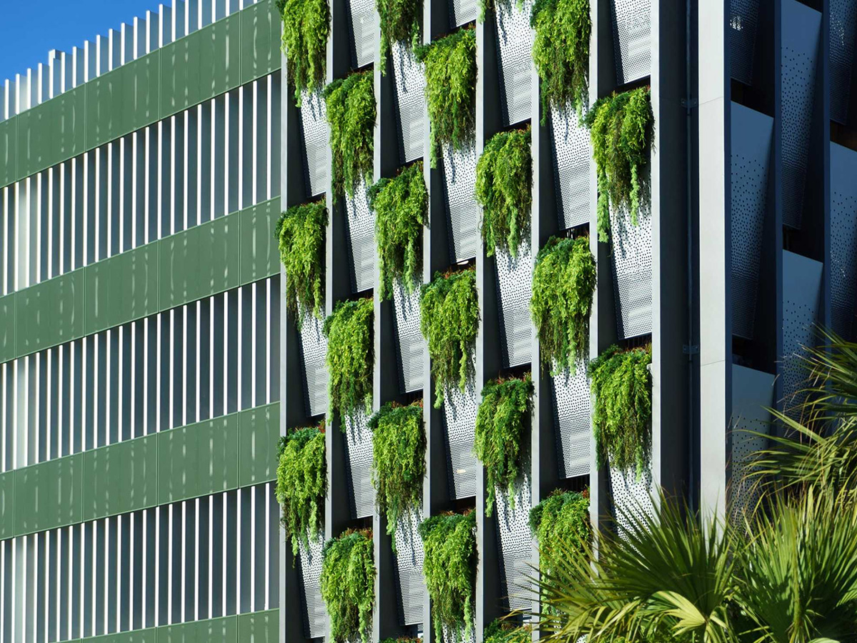 architectural metal display with natural planters