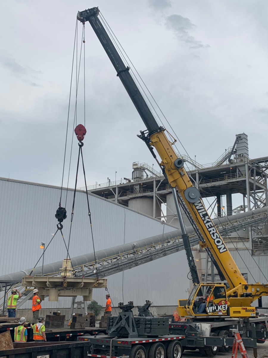 installing production systems with crane