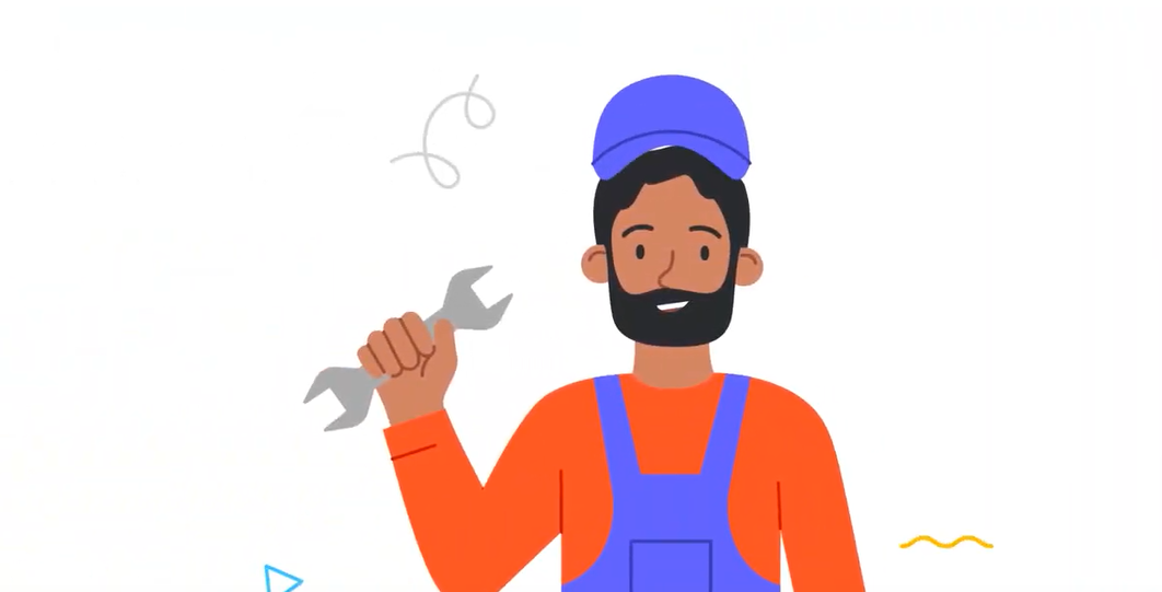 cartoon image of a construction worker wearing overalls and holding a wrench