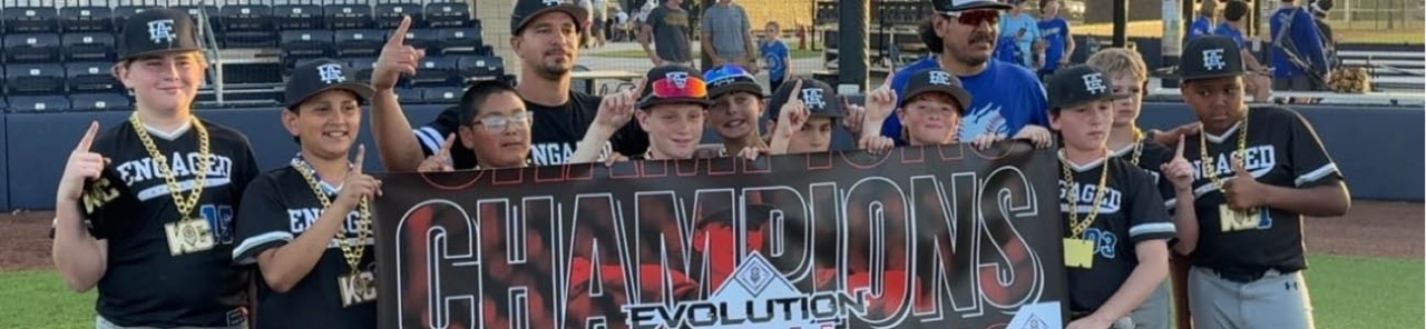 Boys from the Engaged Athletics 11U baseball team in Merriam, KS, hold a sign reading 
