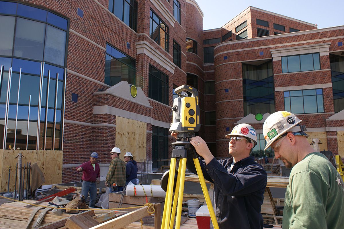 vdc technicians surveying construction site